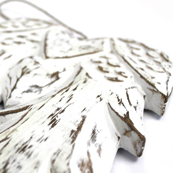 hand carved from sustainable albesia wood and finished in white washed process. Each decoration is distressed by hand giving each piece it's own uniqueness.These pretty angel wings make a lovely gift or home decoration