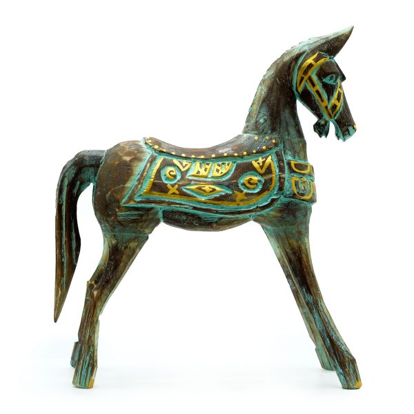 this exquisite decorative horse is adorned with intricate carvings and highlighted in vibrant gold and turquoise accents. This unique item appeals to customers looking for distinctive and high-quality home décor. Its larger size makes it an eye-catching centerpiece