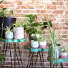 flat packed to save space when stored or not in use.These stands requires some basic assembly.These stands should not be used as stools.Approximate dimensions:  - The stand tops come in a range of 3 sizes as standard - 22cm