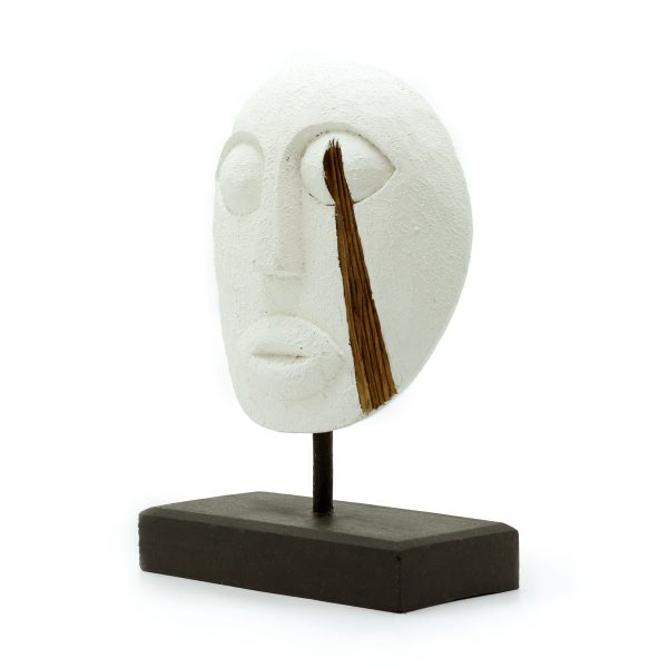 this unique piece combines traditional Timor craftsmanship with a contemporary white finish. This decorative mask appeals to customers seeking distinctive and culturally rich home décor items. Its striking design and neutral color make it a versatile addition to any interior style. Stock this captivating mask to attract customers and boost your product offerings